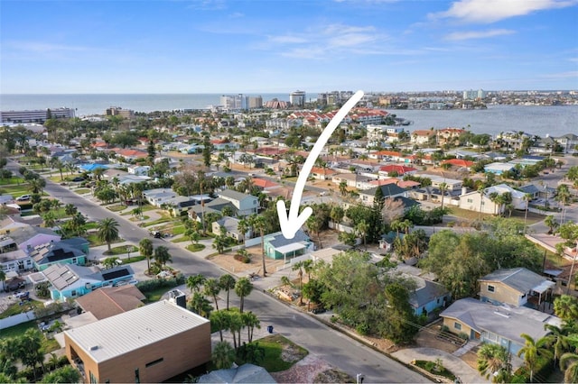 bird's eye view with a water view