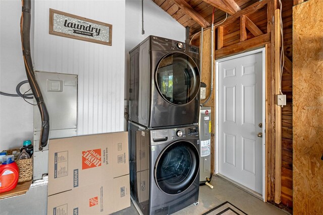 laundry area with water heater, laundry area, and stacked washer / dryer