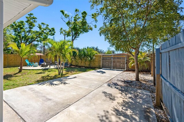 view of patio / terrace with a gate and a fenced backyard