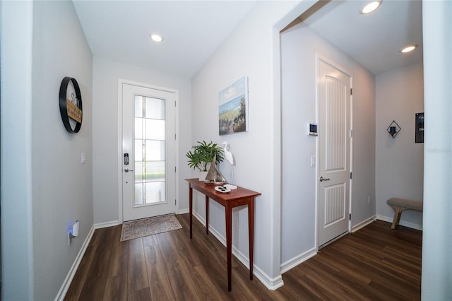 entrance foyer with recessed lighting, baseboards, and dark wood-style flooring