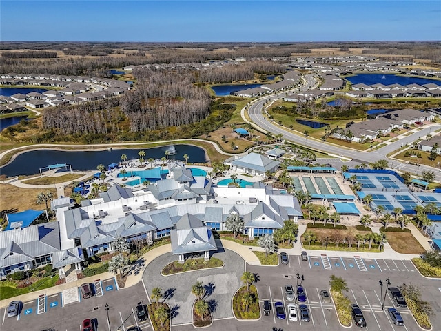 aerial view with a residential view and a water view