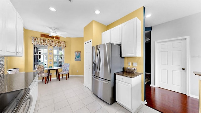 kitchen with white cabinetry, stainless steel appliances, and recessed lighting