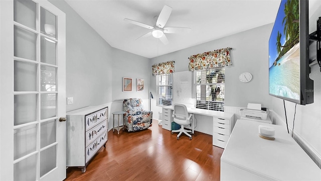 office with a ceiling fan and wood finished floors