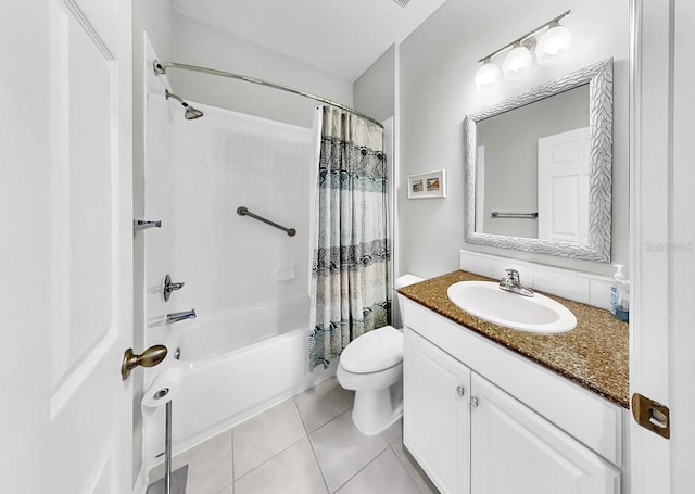 bathroom with toilet, tile patterned flooring, shower / tub combo with curtain, and vanity