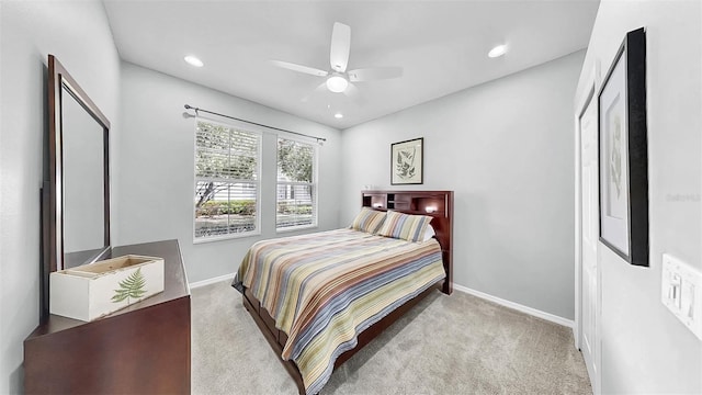 carpeted bedroom with ceiling fan, baseboards, and recessed lighting