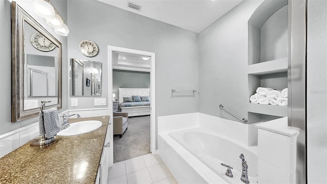 full bathroom with a garden tub, visible vents, vanity, ensuite bath, and tile patterned floors