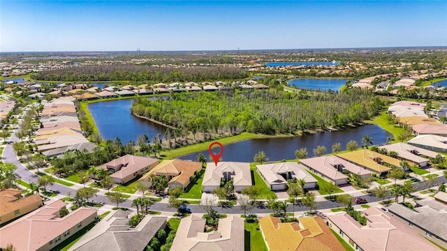 aerial view with a residential view and a water view