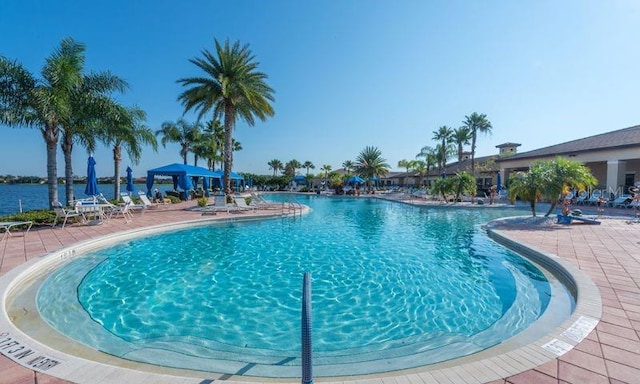 community pool featuring a gazebo and a patio area