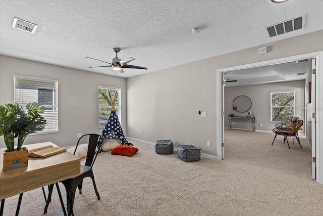 home office with visible vents, baseboards, and carpet floors