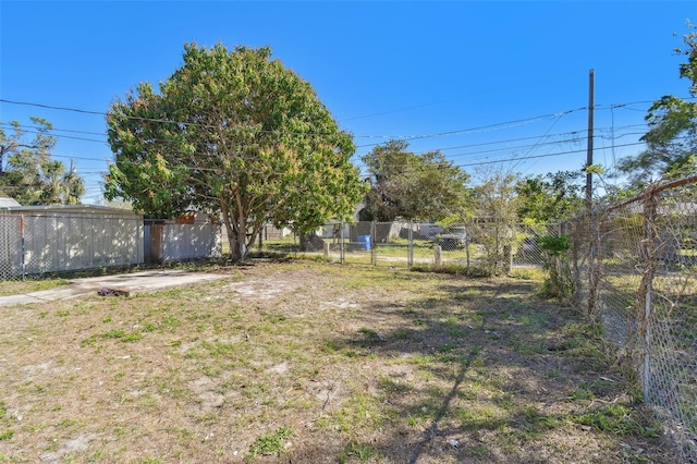 view of yard featuring fence