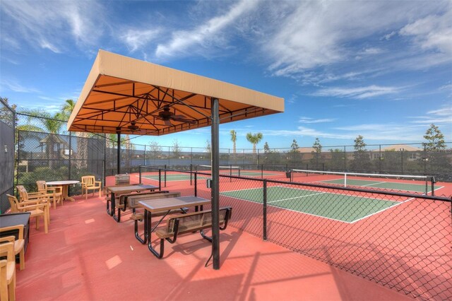 view of sport court with fence