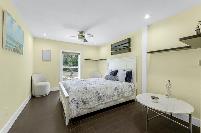 bedroom with dark wood-style floors, recessed lighting, a ceiling fan, and baseboards