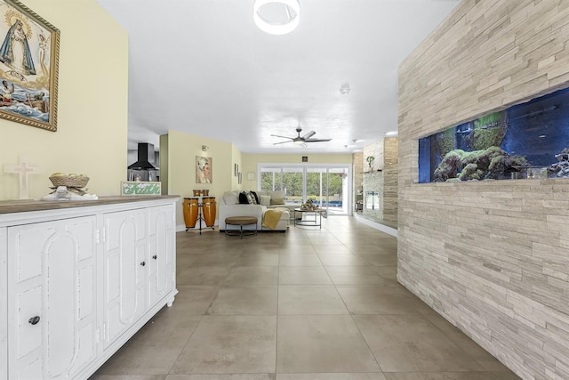 hall with light tile patterned flooring