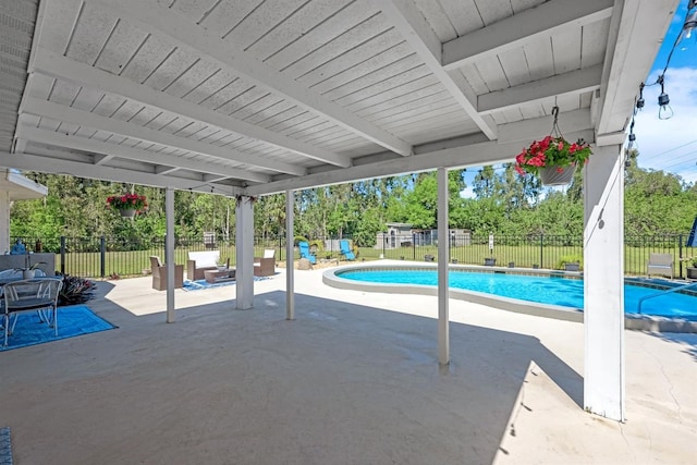 view of swimming pool with a patio, a fenced backyard, and a fenced in pool