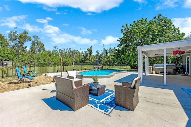 view of swimming pool with a patio, a fenced in pool, a fenced backyard, a hot tub, and an outdoor hangout area