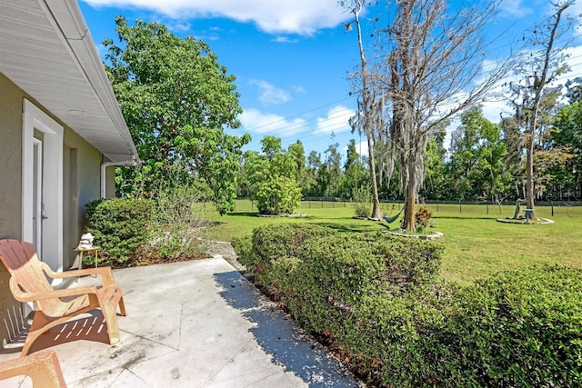 exterior space featuring a patio and fence