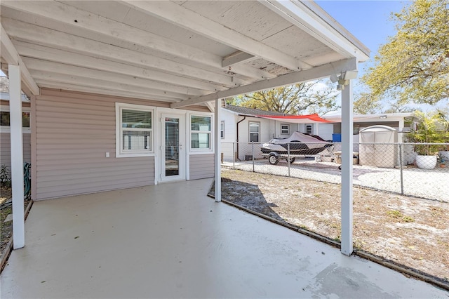 view of patio / terrace featuring fence