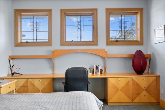 bedroom featuring built in study area