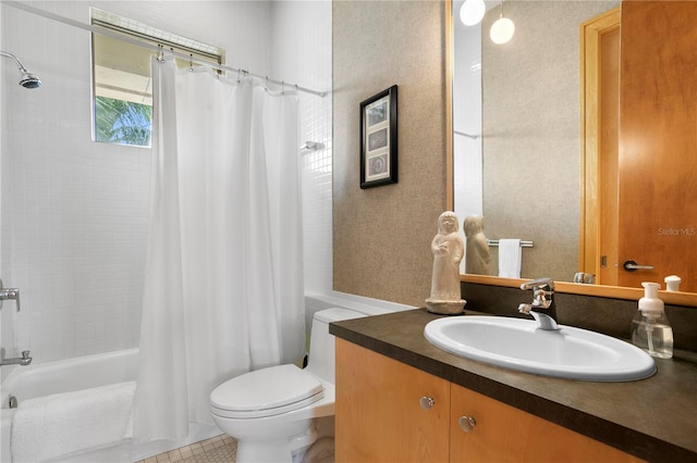 bathroom with vanity, shower / bath combination with curtain, and toilet