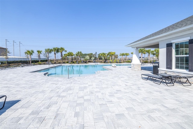 community pool featuring a patio