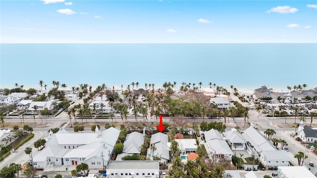 bird's eye view with a residential view and a water view