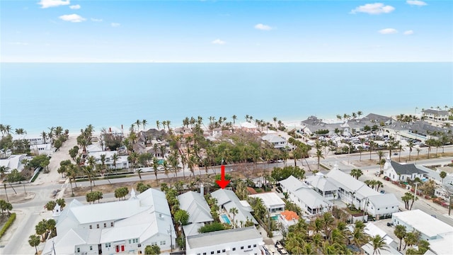 bird's eye view featuring a residential view and a water view