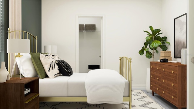 bedroom featuring a closet and baseboards