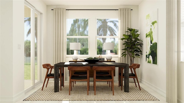 dining room featuring baseboards