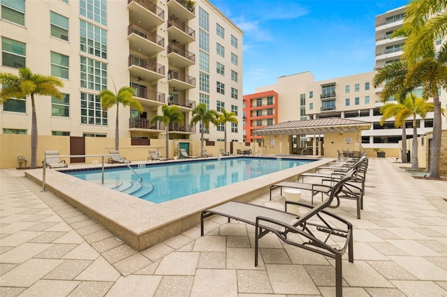 pool featuring a patio area