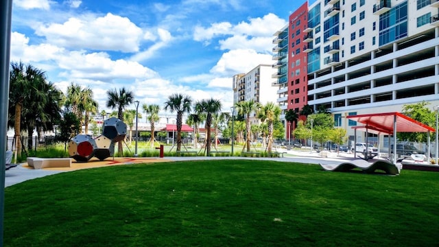 view of community featuring a yard