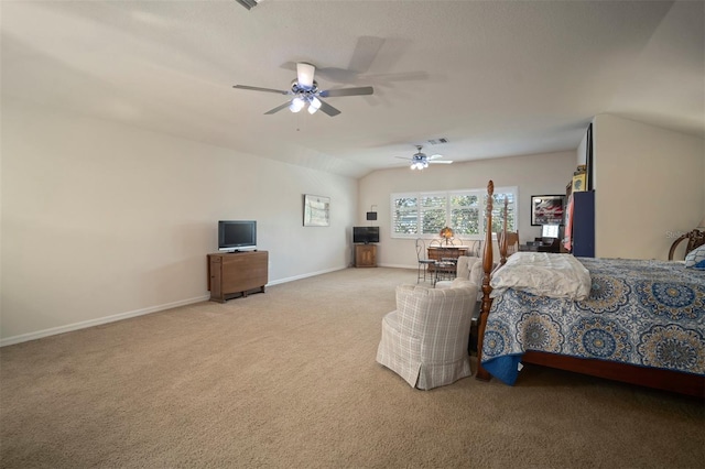 carpeted bedroom with visible vents, baseboards, lofted ceiling, and a ceiling fan