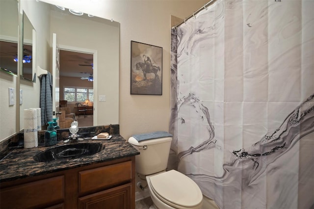 full bath featuring toilet and vanity