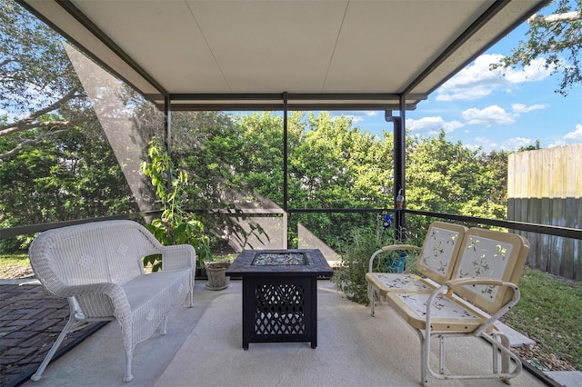 exterior space with fence and an outdoor fire pit