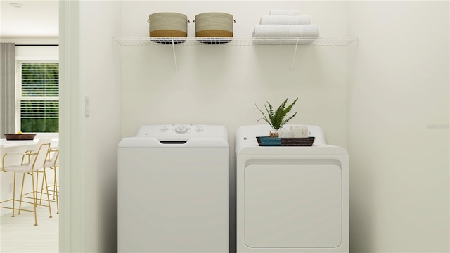 laundry area featuring laundry area and separate washer and dryer