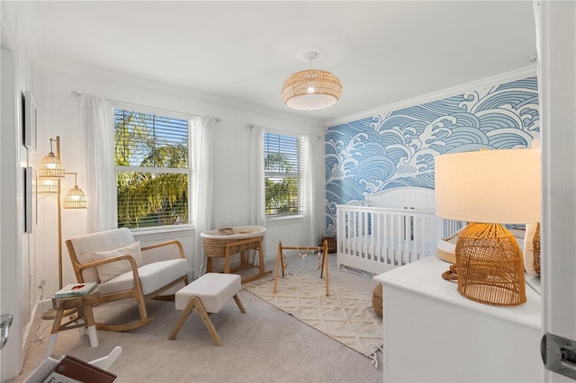 bedroom with carpet flooring, baseboards, crown molding, and wallpapered walls