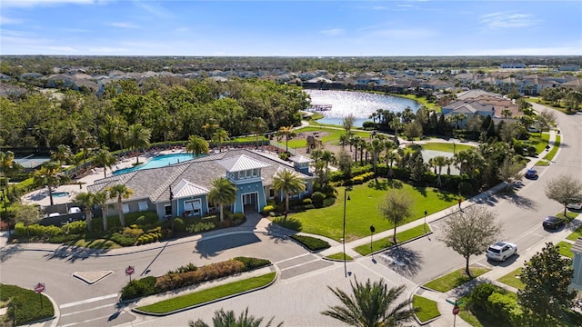 drone / aerial view with a water view