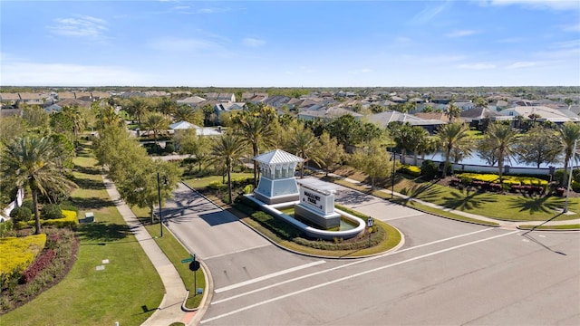 birds eye view of property with a residential view