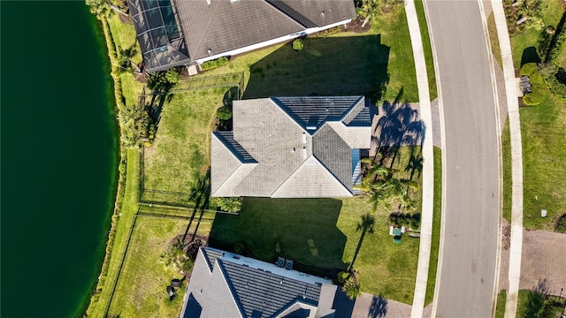 drone / aerial view featuring a water view