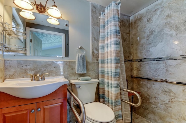 full bath featuring tiled shower, toilet, tile walls, and vanity