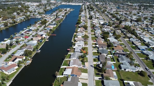 aerial view featuring a residential view and a water view