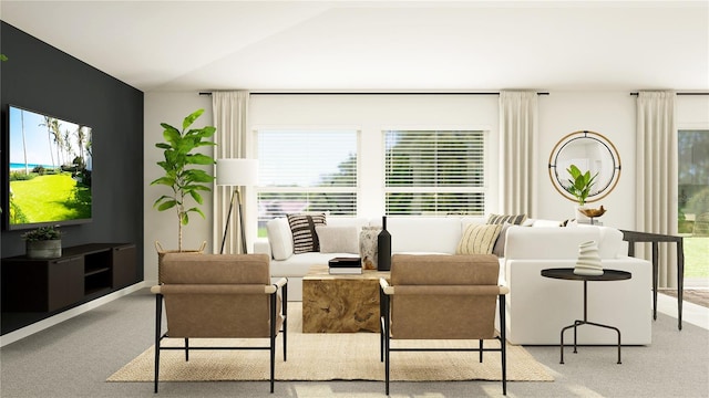 living room featuring carpet floors and vaulted ceiling