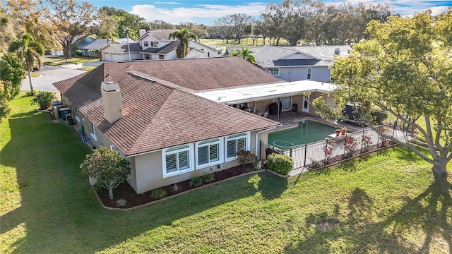 birds eye view of property with a residential view