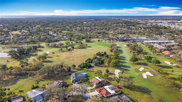 bird's eye view featuring view of golf course and a residential view