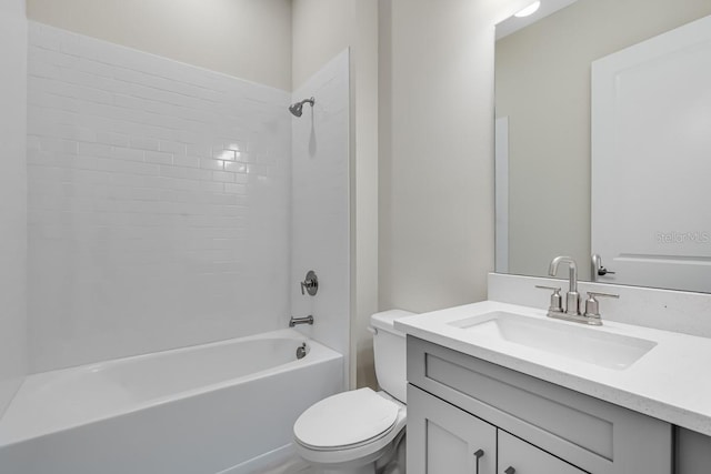 full bathroom with vanity,  shower combination, and toilet
