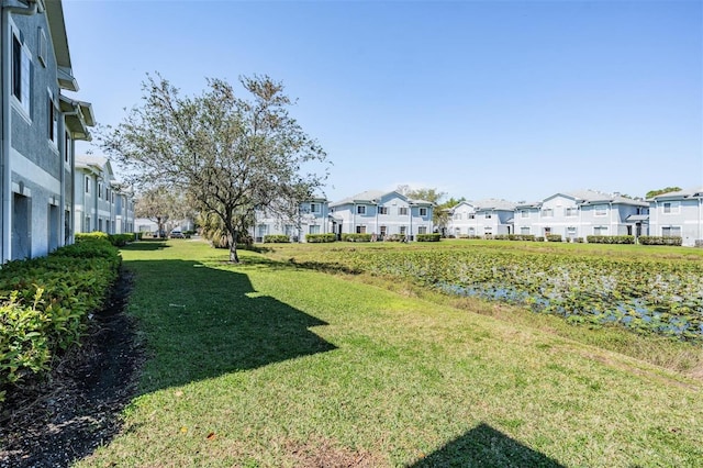 view of yard featuring a residential view