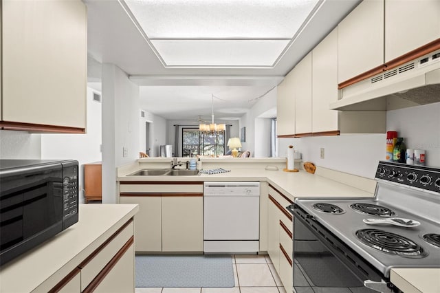 kitchen featuring a sink, under cabinet range hood, electric range oven, black microwave, and dishwasher