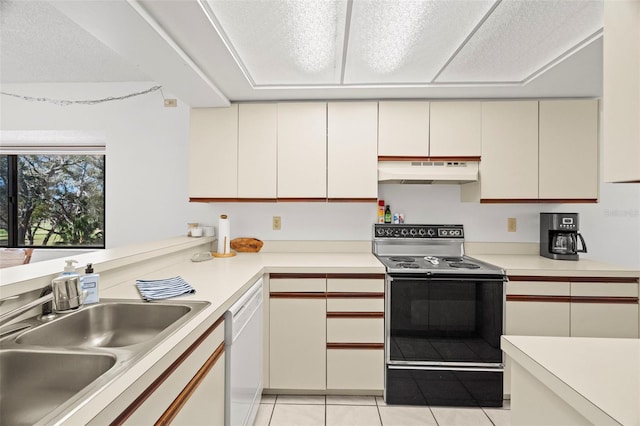 kitchen with under cabinet range hood, dishwasher, light countertops, black electric range oven, and a sink