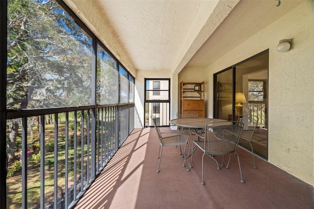 unfurnished sunroom featuring plenty of natural light