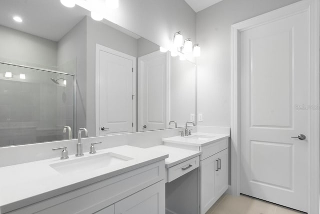 3563 Santa Caterina Blvd, Bradenton, FL 34211 - bathroom featuring vanity, tile patterned floors, and a stall shower