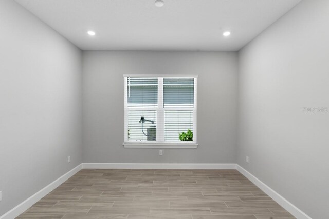 3563 Santa Caterina Blvd, Bradenton, FL 34211 - empty room featuring recessed lighting, light wood-style flooring, and baseboards